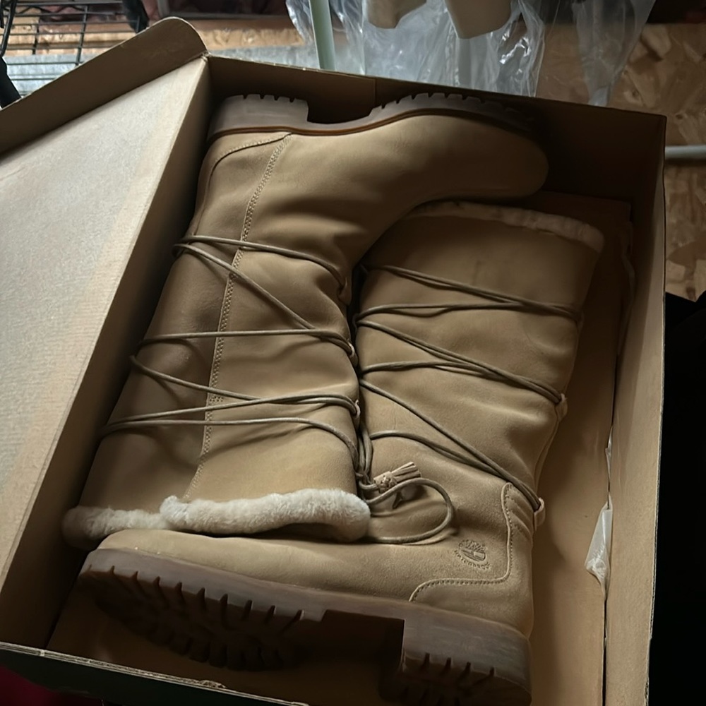 Timberland shearling lined beige suede boots in size 10. Worn once and stored.